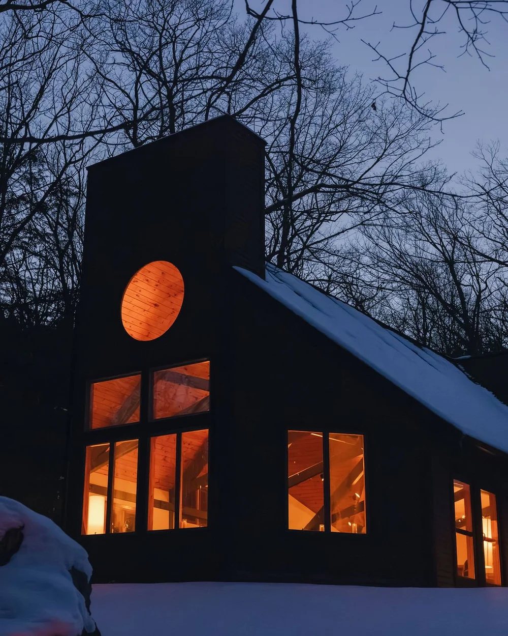 The Temple at The Thyme lit from inside at dusk